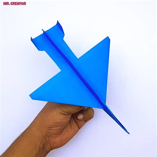 5.9K views · 30 reactions | From a Simple Fold to a High-Flying Machine ✈️ The Art of Paper Jet Plane Design How to Fold the ULTIMATE Paper Jet Plane! ✈️ (Easy Step-by-Step Tutorial) Looking for a fun family activity? The paper jet plane challenge is perfect for all ages! We'll give you ideas for games and contests to see whose creation flies the farthest and highest. #PaperAirplane #PaperJet #HowTo #DIY #PaperCrafts | Mr. Creator | Facebook