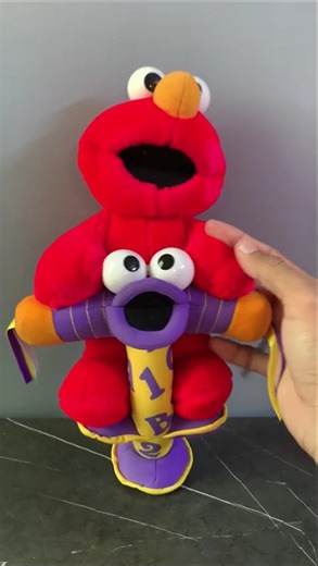 Fisher-Price Sesame Street Jump & Learn Elmo Plush Toy.