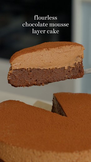 From my new book, Even More Basics to Brilliance, this rich and elegant Flourless Chocolate Mousse Layer Cake starts with the fudgiest flourless chocolate cake. To ensure gooey chocolatey perfection, start by lining your tin with eco-friendly, home compostable bake paper. Top the cake using my foolproof method for the dreamiest cloudlike chocolate mousse. This impressive chocolate dessert cake will take you from basics to brilliance. D.x Find the recipe here: bit.ly/FlourlessChocolateMousseCake