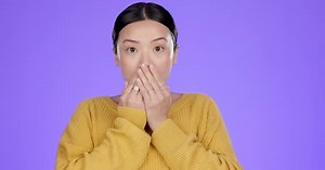 Shock, surprise and face of a Asian woman in a studio with a with a omg facial expression