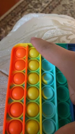 Engaging with Colorful Pop-It Toy: ASMR Experience