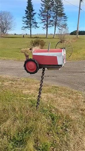 In Maine, a tractor mailbox; farmer shows farming pride with a tractor mailbox. How intricate! | Ronnie Southbuckle