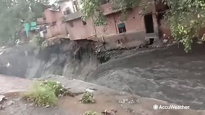 23K views · 528 reactions | A resident of a neighborhood outside of New Delhi caught cellphone footage on Sunday showing powerful floodwaters that caused a house to collapse and be washed into a pit far below following heavy rains that deluged the area: https://bit.ly/3js38Td | AccuWeather | Facebook
