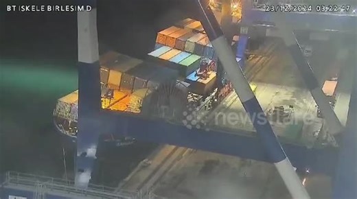 Cargo ship capsizes sending containers toppling into water