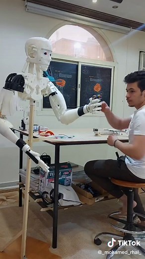 Exploring 3D Printing Setup: Hands, Tools, and a Cat