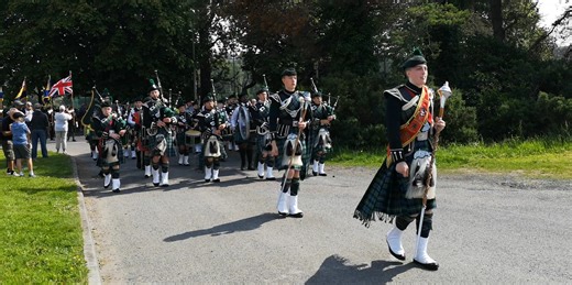 Marching into the airfield in Newtownards on Armed Forces Day are Friends of Campbell College Pipe Band | We Love Pipe Bands