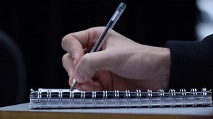 Student Writing Notepad: стоковое видео (без лицензионных платежей), 1011165587 | Shutterstock