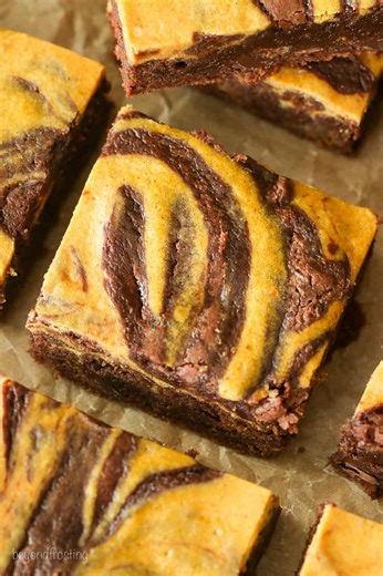 Where have these been all my life?! 🍂 These pumpkin swirl brownies are literally the best of both worlds; gooey, fudgy chocolate brownies meets creamy, spiced pumpkin cheesecake. 🎃🍫 I love both, so for me this is hands down the best fall dessert. Cozy, decadent, and 100% worth making on repeat this season! Comment PUMPKIN if you want the recipe! | Beyond Frosting
