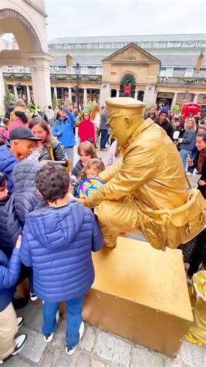 Trick or treat on the street from London levitating Goldman living statue. #londongoldmanstatue
