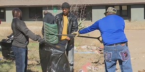 Volunteers clean up ‘dumping ground’ Moss Rose Community Center