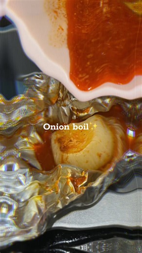 Y’all want the full recipe??? 🫣👀 #Jynah #onionboil #recipe #fypシ Cut Onion core seasonings Unsalted butter Slap ya mama Creole Onion powder Garlic Powder Minced Garlic Paprika Cayenne pepper Pour half of the seasoning on top Wrap with foil Bake for 1:10 hours on 375