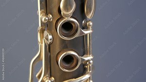 Closer look of the holes in the modern flute. a flute is an aerophone or reedless wind instrument that produces its sound from the flow of air across an opening.