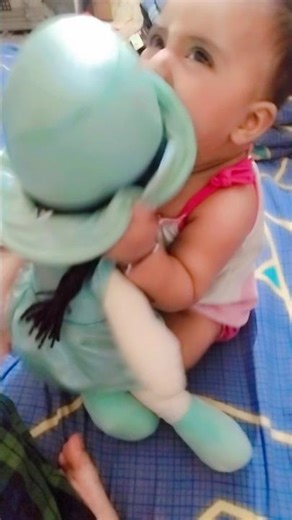 playing with her favorite doll💓🥺 #5monthsbaby #babyreaction #babyshorts #happybaby #babysmile