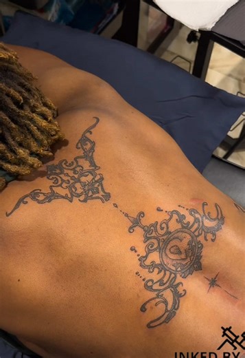 Beautiful Female Ornamental Back Tattoos