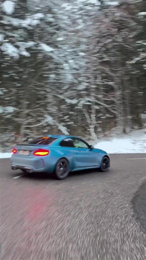 Profesional drifter drifting in mountains with snow