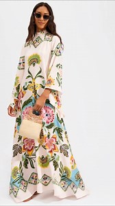 Obsessed with the Amber Bloom Flowing Maxi Dress!  The vibrant...