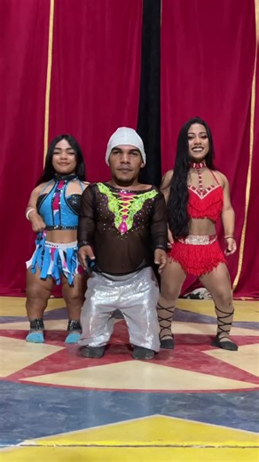 Energetic Dance Performance on Colorful Stage