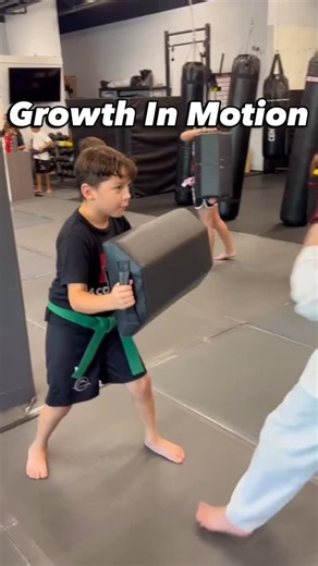 Growth happens here. The kids in this video aren’t just practicing martial arts, they’re learning how to work together, and for our green belt, how to lead. At CORE, we build strong members and an even stronger community. 💪 #WeAreCORE #BrentwoodKids #MMA #martialarts | Max Academy CORE