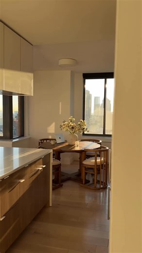 Emma Rose on Instagram: "I love my little dining nook 🤎 @sixpennyhome Pia Dining table & Bene Dining Chairs #newyork #newyorkcity #newyorkapartment"