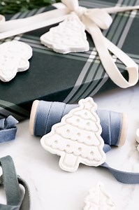 These DIY White Salt Dough Ornaments are a bright white twist on traditional salt dough and are a fun way to create ornaments for your Christmas tree and presents. | Domestically Blissful