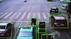 clip-1027136891-cctv-camera-real-time-tracking-vehicles-people-on