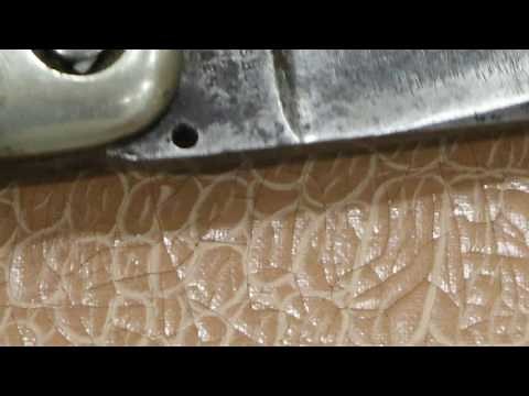 Brad West The Press Button knife. An antique switchblade mechanism