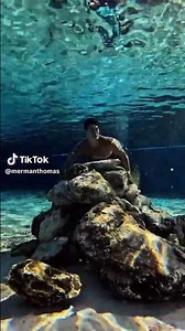 Hot 🔥Sexy Mermen🧜‍♂️: Merman Thomas, Underwater in Just a Gorgeous Mer-tail, swims from behind rock
