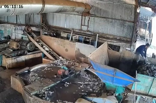 Horrific video shows factory worker being pulled to his death into giant industrial shredder