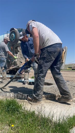 Pouring “donuts.” They’re a one-piece precast concrete pad for around Cobett livestock waterers to make sure your calves can always reach water, and to protect your tank. All this one still needs is the rake finish and some time to cure out, and then will be ready to get to work. | The Stock Step