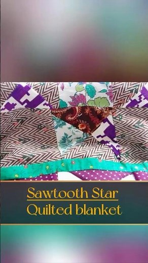 This quilt is a beautiful example of traditional patchwork techniques, blending multiple