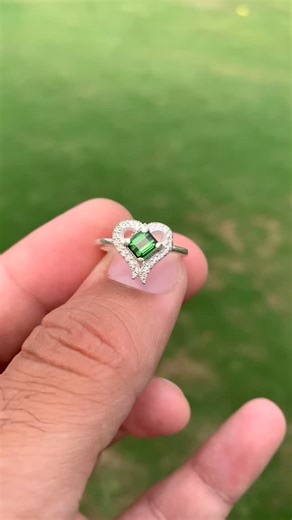 A love story carved in stone 💚✨ This Green Tourmaline sits at the center of a stunning heart-shaped halo silver ring—where elegance, emotion, and craftsmanship meet. A ring that speaks without words… perfect for someone who loves meaningful beauty. DM @ot_gemstones for details. #GreenTourmaline #TourmalineRing #HeartHaloRing #GemstoneRing #NaturalGemstones #FineJewelry #HandmadeJewelry #TourmalineLove #GemstoneAddict #BirthstoneJewelry #JewelryOfTheDay #StatementRing #UniqueJewelry #LuxuryJewel