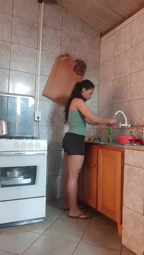Washing Vegetables in a Modern Kitchen Setting