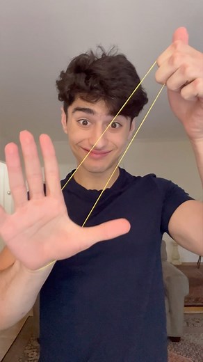 Milaad Khodadoust on Instagram: "RUBBER BAND MAGIC TRICK TUTORIAL 😱😳 #tutorials #tutorial #magician #comedyvideos #magi #magia"