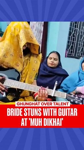 A video of a newlywed Indian bride performing at a gathering has gone viral, facing backlash. The clip shows her playing the guitar and singing while maintaining the traditional ghoonghat. #bride I #guitarperformance I #relatives I #RepublicWorld | Republic