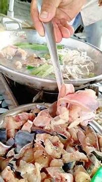 Thai-style catfish stew with fermented rice sauce, grilled chicken, brothers gathering for a casu...