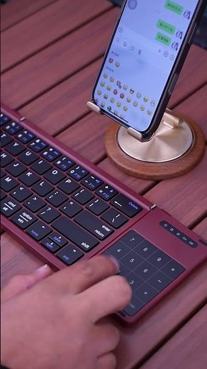 A foldable keyboard with a built-in touchpad and numeric keypad, perfect for taking on the go.