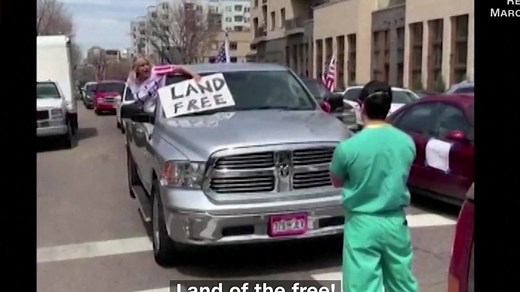 Watch health care workers take a stand against protesters