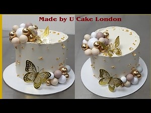 Cute 10th birthday cake with balls and butterfly