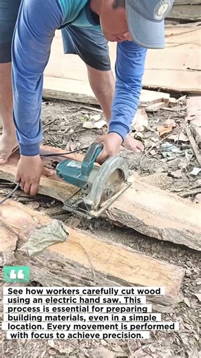 the process of cutting wood using an electric hand saw.