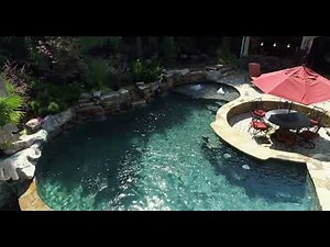 Dual-Level Luxury Pool with Cascading Waterfalls & Naturalistic Design | Sophisticated Pool Design
