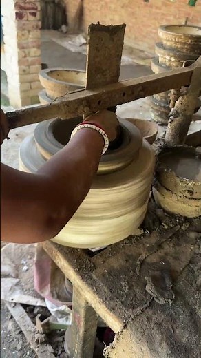 Watch how to make a bowl out of clay and mud.