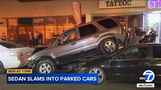 Sedan slams into parked cars on Anaheim street, video shows