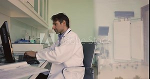 Mature GP or sonographer working on personal computer in hospital office, logging into clinic system, reviewing patient anamnesis, accessing medical records, consults clients remotely, prepare report