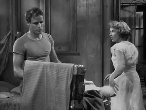 Remembering Marlon Brando and Kim Hunter in... A Streetcar Named Desire is a 1951 American drama film, adapted from Tennessee Williams's Pulitzer Prize-winning 1947 play of the same name. It tells the story of a southern belle, Blanche DuBois, who, after encountering a series of personal losses, leaves her aristocratic background seeking refuge with her sister and brother-in-law in a dilapidated New Orleans apartment building. The Broadway production and cast was converted to film with several c