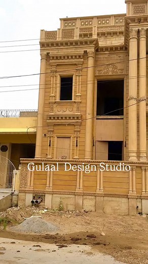 “Design a beautiful modern house elevation with a perfect blend of natural and contemporary materials. The facade should feature large glass windows, a flat or slightly sloped roof, warm wood paneling, white stucco or concrete walls, and sleek metal accents. Include a landscaped front yard with minimalist lighting, a clean driveway, and modern entry steps. The design should be elegant, symmetrical or asymmetrical with balanced proportions, and suitable for an upscale residential neighborhood. Na