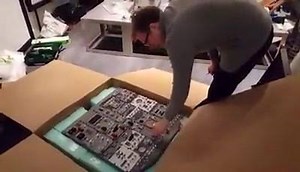 Just a little like Christmas when you get to have your customer open the boxes (presents) while you continue to assemble the simulator. Happy customer. | Flightdeck Solutions, Ltd (FDS)