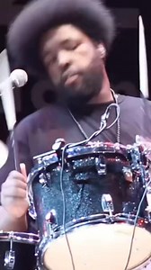 Happy National Drum Month! 🥁 Ahmir “Questlove” Thompson– 6x Grammy winner, Oscar-winning director, bestselling author and legendary drummer/frontman for The Roots. Known for blending hip-hop, funk, and jazz with deep music knowledge and soul. A true cultural icon on and off the stage. Shop The Roots' vinyls out now! | Urban Legends