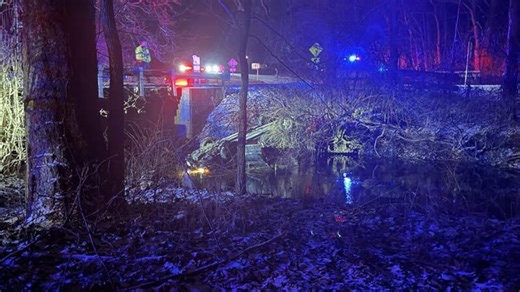 Car slides off bridge, into creek due to icy conditions along Greene County road