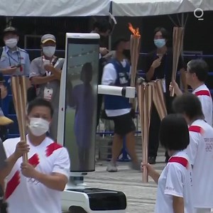 🤖 HAPPENING NOW: A robot joins the Torch Relay as the #Tokyo2020 Olympics kicks off in Japan. https://trib.al/LHK1mB3 | Bloomberg Originals