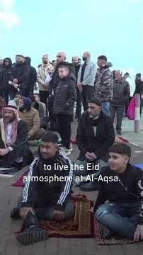 Palestinians in Jerusalem pray Eid prayers in the streets as Israel closes Al-Aqsa Mosque